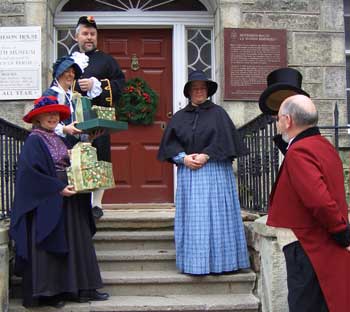Townsfolk in period costume on the steps of the Perth Museum